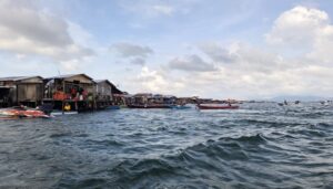 Smiles fade, but memories remain. Photo of the village as they departed by the authors