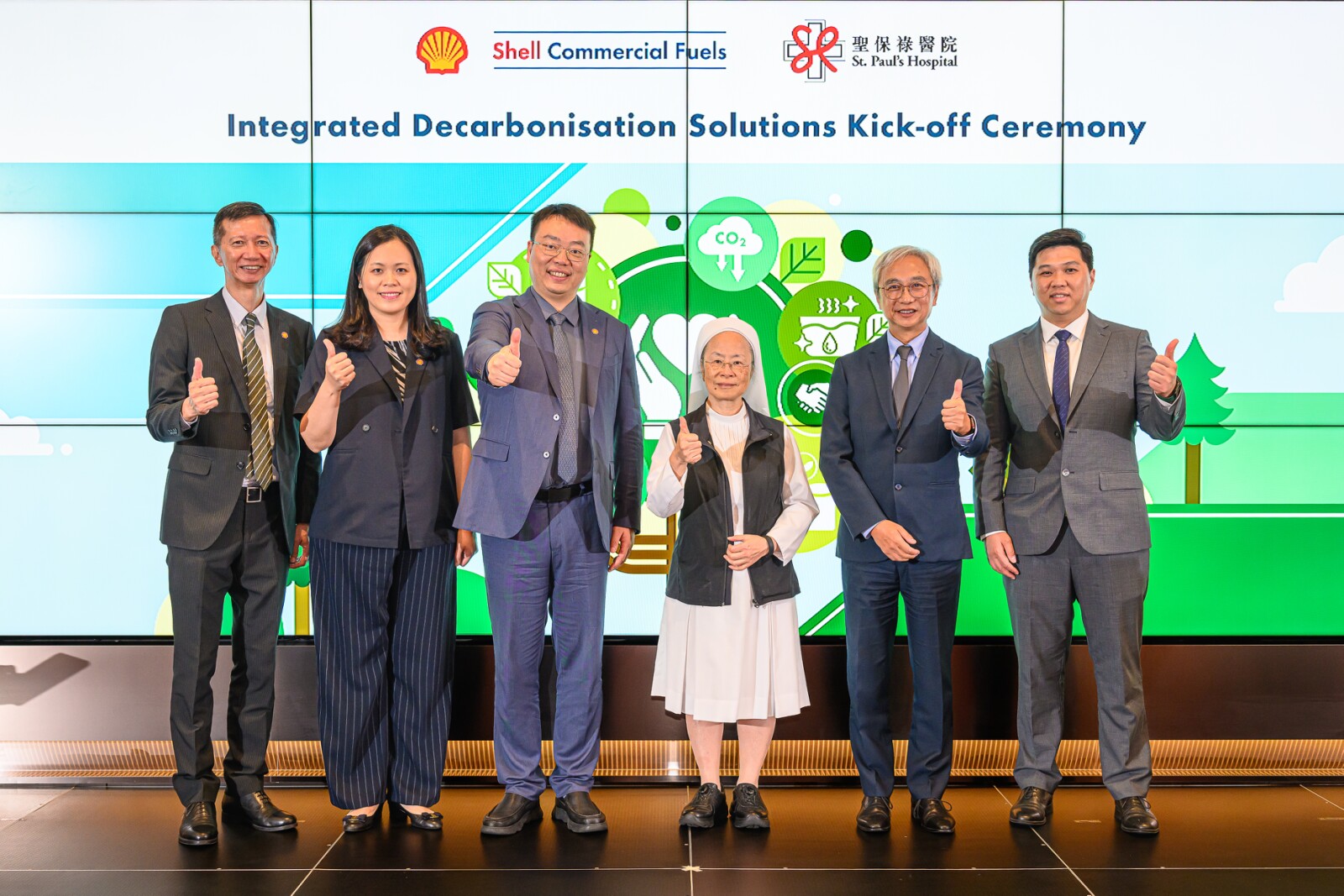 (From left) Mr. Dick Chan, General Manager of Shell Commercial Fuels - Hong Kong and Macau; Ms. Berry Wong, General Manager of Shell Mobility - Hong Kong and Macau; Mr. Hu Chuan, Vice President of Shell Mobility & Convenience – China; Sr. Nancy Cheung, Managing Director of St. Paul's Hospital; Mr. Gilbert Lee, General Manager of St. Paul's Hospital; and Mr. Keith Ho, Facilities Manager of St. Paul's Hospital, witness the launch of the "Integrated Decarbonisation Solutions".