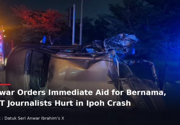 Overturned car after the accident in Ipoh involving Bernama and NST journalists