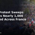 Crowd of protesters marching in Paris