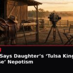 News graphic of a ranch stable with a saddle, cowboy hat, cane and TV camera, with the headline: Stallone Says Daughter’s Tulsa King Role Is Of Course Nepotism